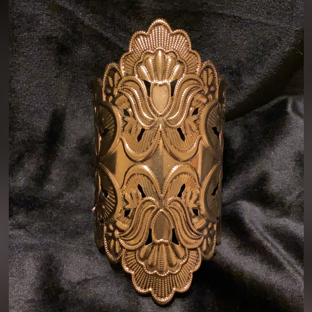 Gold cuff bracelet.